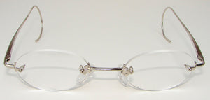 Regal Rimless Eyeglasses w- Cable Spring Temples